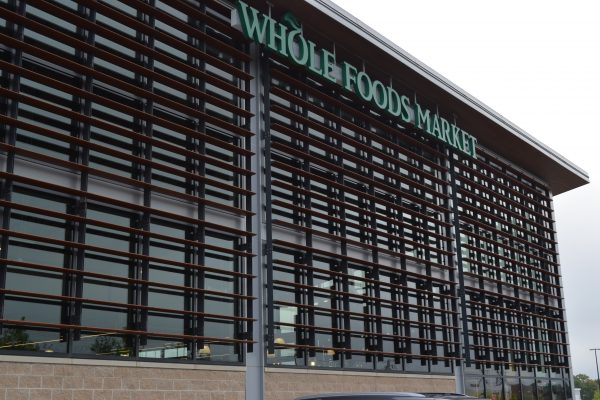 Commercial sunshades installed on a Whole Foods Market building